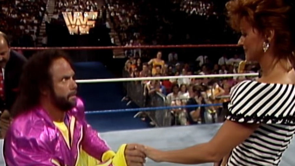 Randy Savage proposing to Miss Elizabeth in the ring