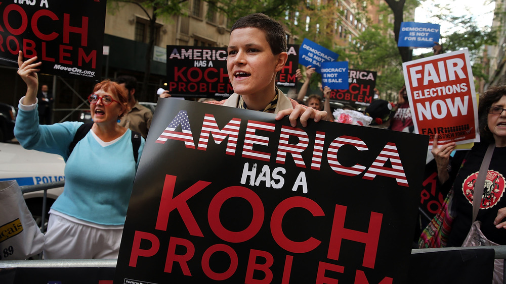 Activists protest Koch influence