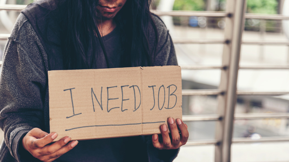 Homeless man begging for job