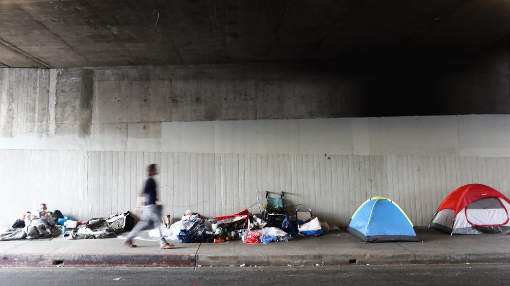 Homeless encampment under overpass