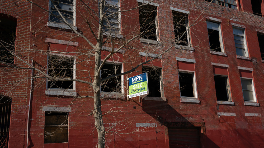 Windows open in vacant apartment building