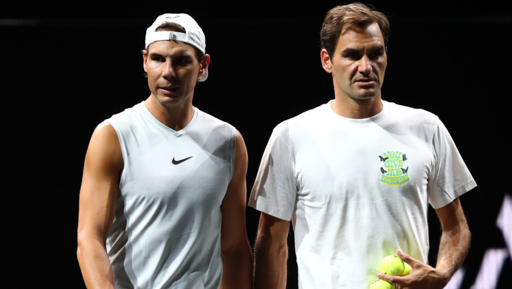 Nadal and Federer, tennis court.