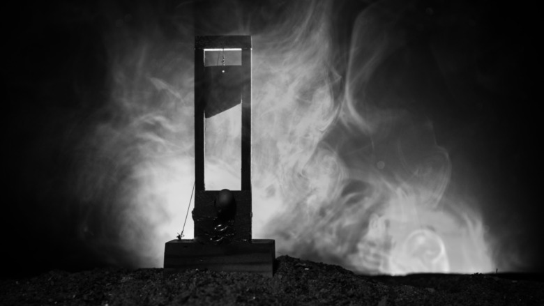 guillotine surrounded in fog