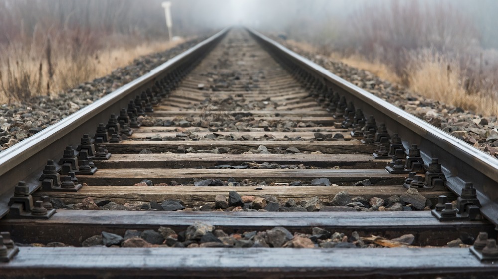 Foggy railroad tracks