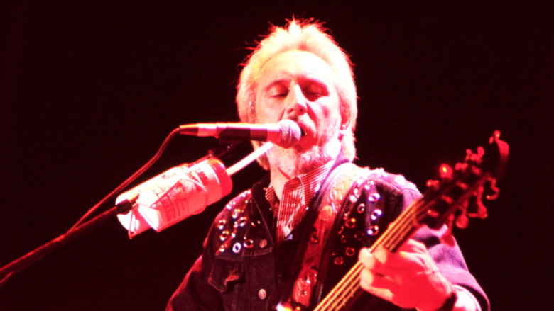 John Entwisle performing in 1989