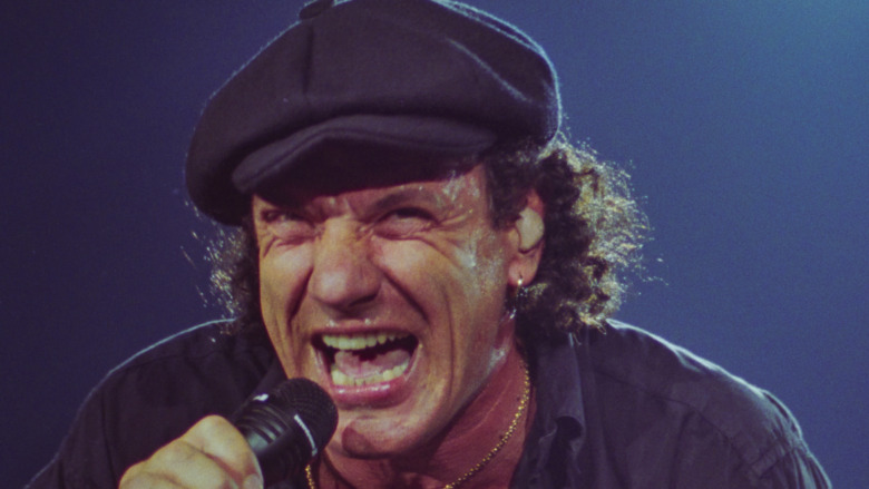 Brian Johnson singing with Angus Young on guitar