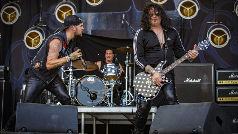 Quiet Riot performing on stage in 2019
