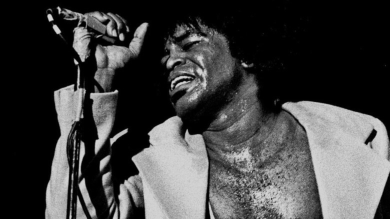 James Brown singing at mic