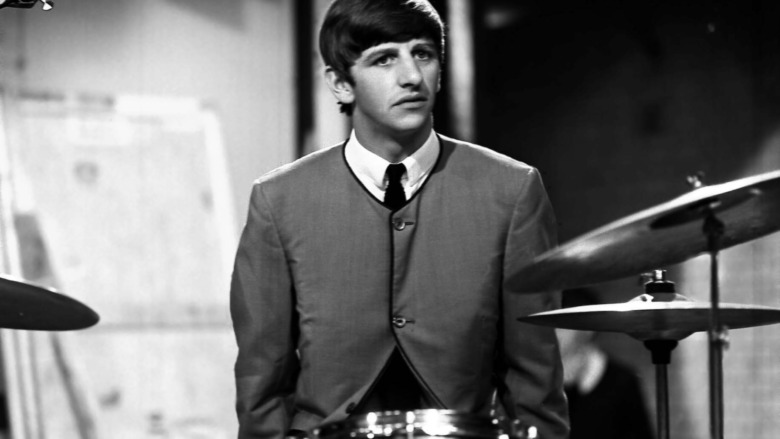 Ringo Starr sitting in front of a set of drums
