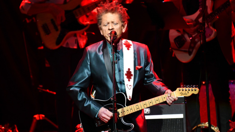 Blondie Chaplin concert playing guitar