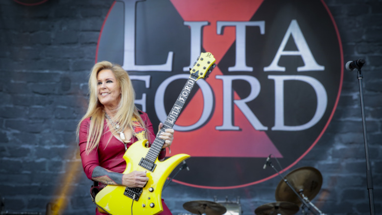 Lita Ford performing with her band