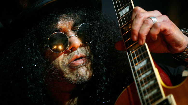 Slash riffs away on his Les Paul