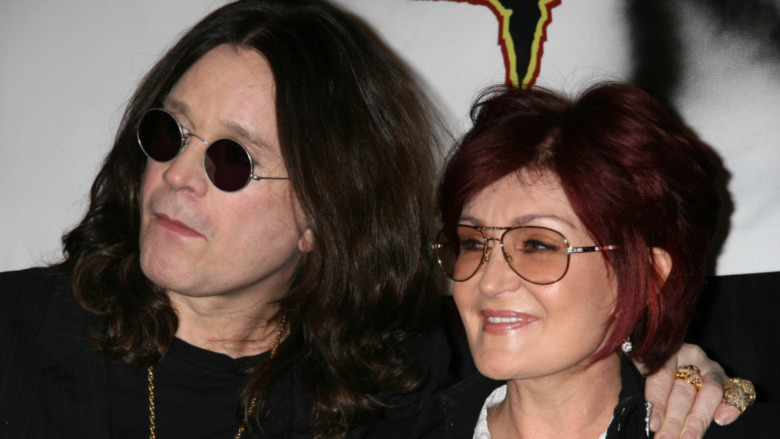 Ozzy and Sharon Osbourne pose for a press photo