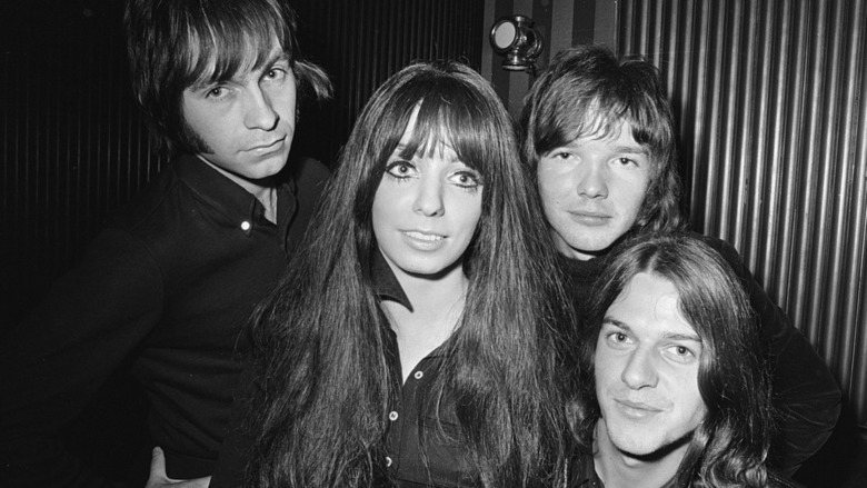 Shocking Blue posing for photo 