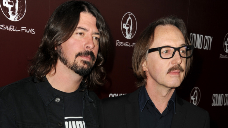 Butch Vig and Dave Grohl looking serious