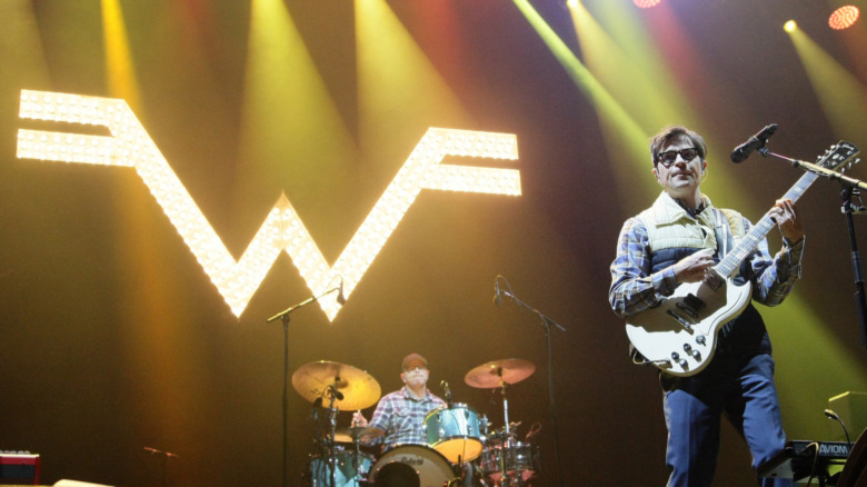 Cuomo plays guitar with Weezer