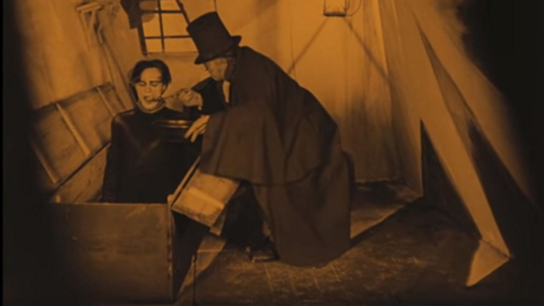 Caligari feeds Cesare in movie scene
