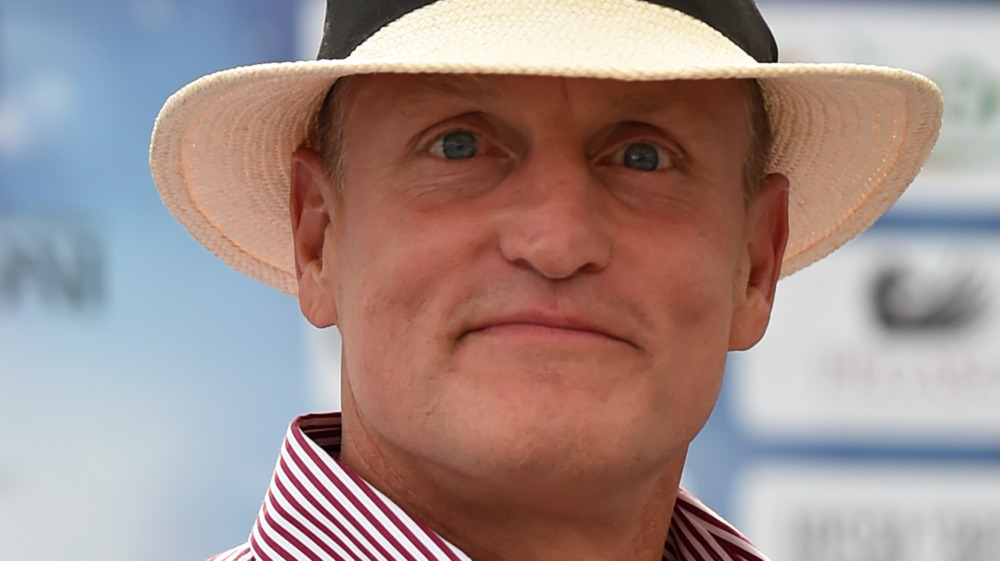 Woody Harrelson wearing straw hat