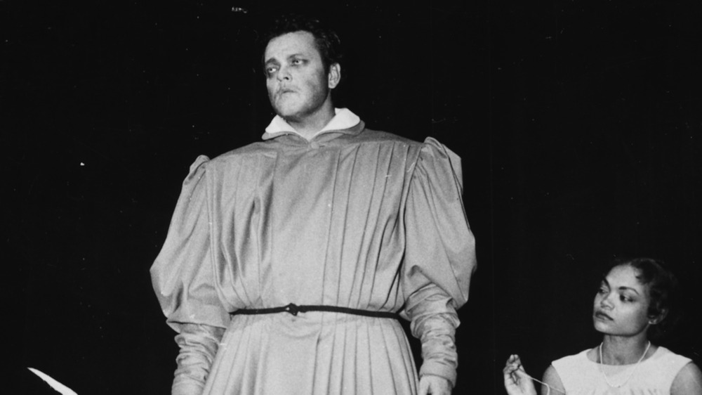Orson Welles with Eartha Kitt on stage as Faust