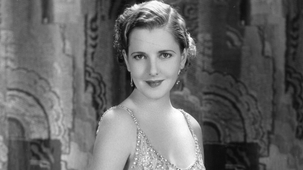 Jean Arthur smiling 