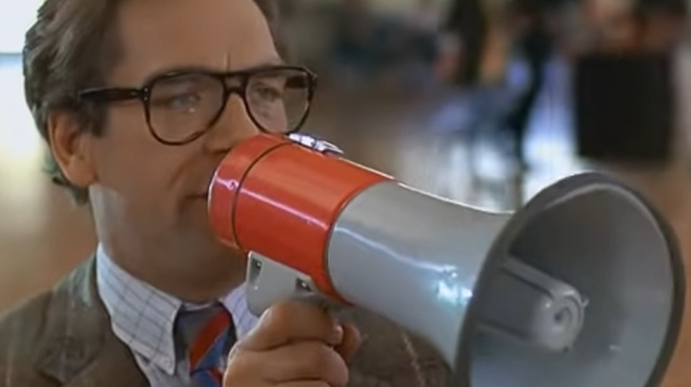 Huey Lewis holding megaphone in Back To The Future