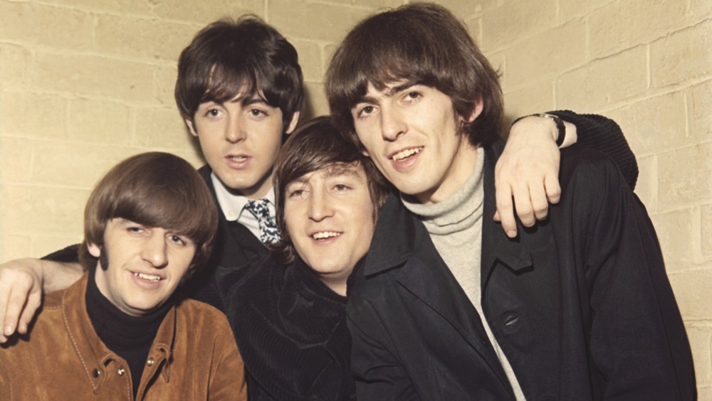 The Beatles smiling 