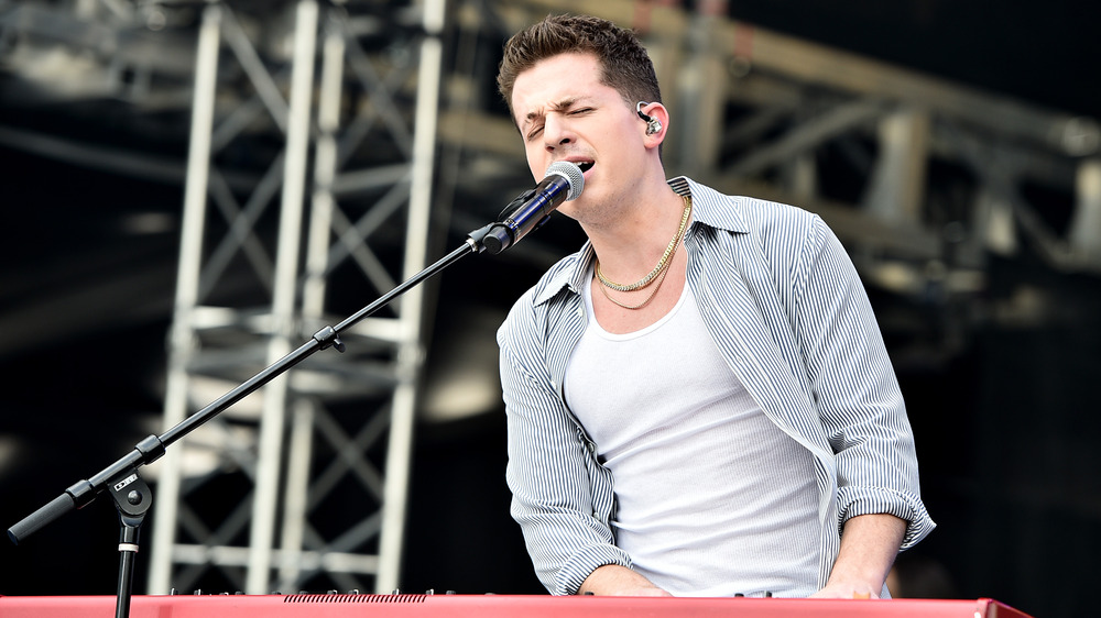 Charlie Puth performing onstage