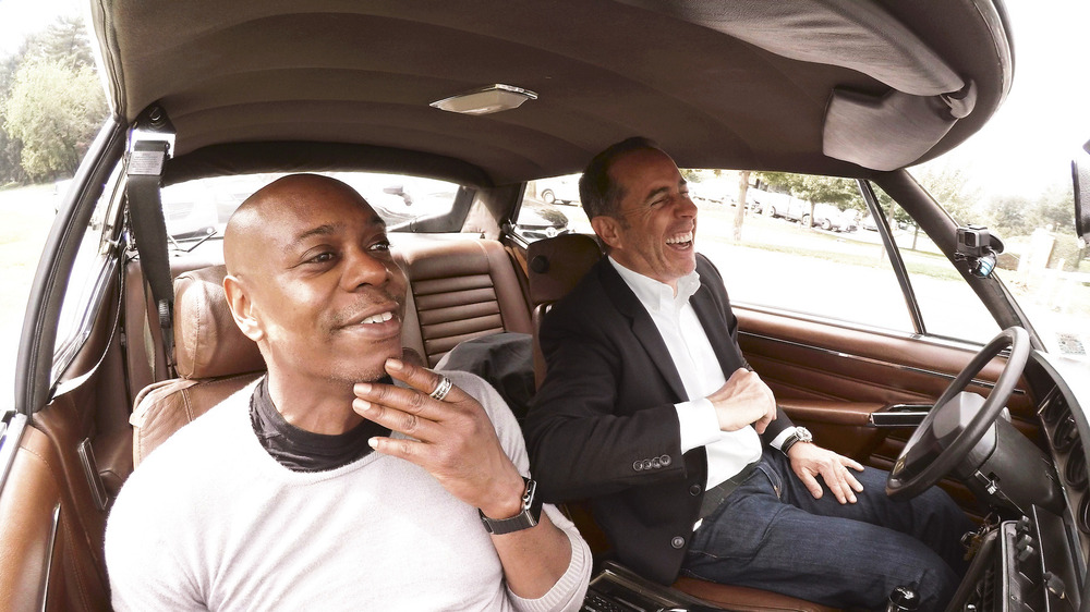 Dave Chappelle and Jerry Seinfeld laughing 