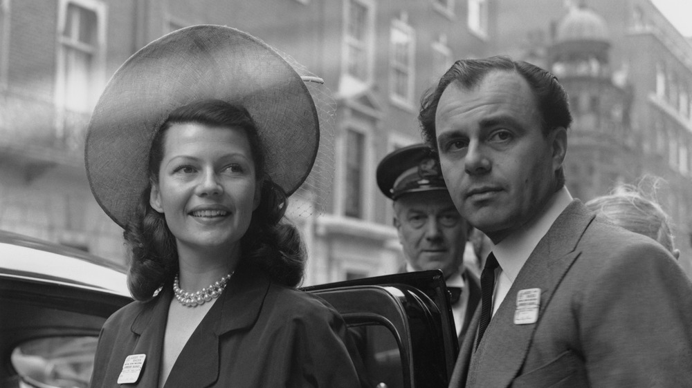 Rita Hayworth with Prince Aly Khan looking to the side