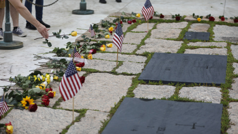 Larry Alan Thorne grave with yellow roses and flags