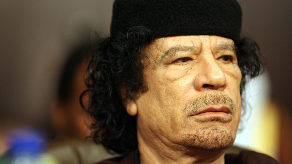 Muammar Gaddafi frowning