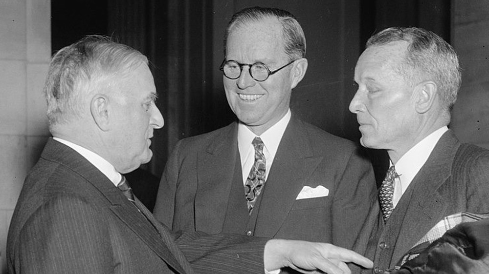 Senator Joseph F. Guffy, Joseph P. Kennedy, and Admiral Emory S. Land talking