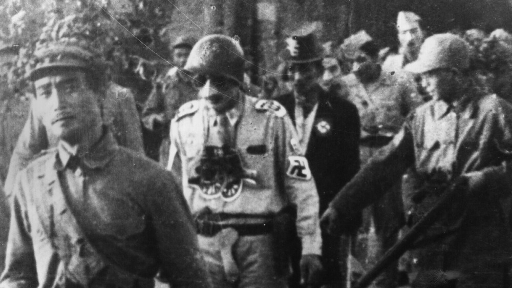 Korean War POWs marching