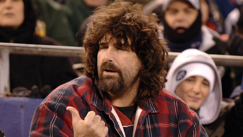 Mick Foley attends NFL game