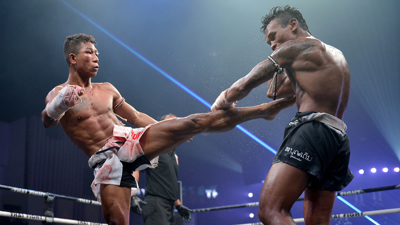 Lethwei fighter blocking a kick