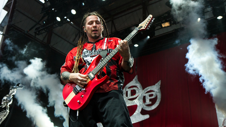 Zoltan Bathory playing guitar