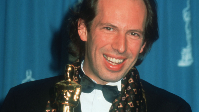 Hans Zimmer holding an Oscar