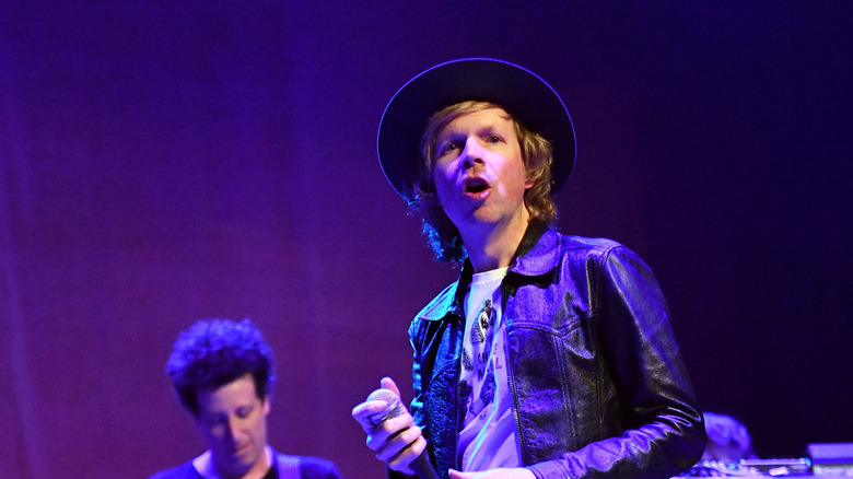 Beck singing on stage
