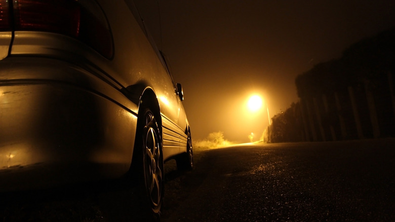 car on dark highway