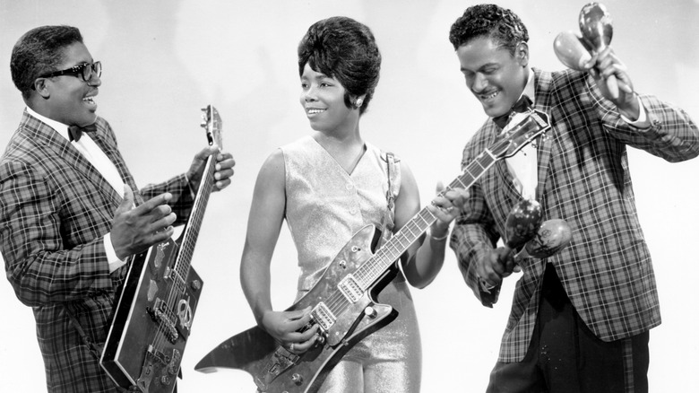 Bo Diddley, Norma Jean Wofford, and Jerome Green performing