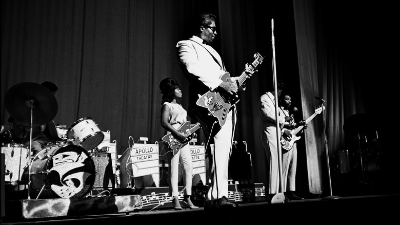 Bo Diddley and his band performing on stage