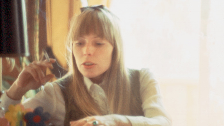 Young Joni Mitchell smoking