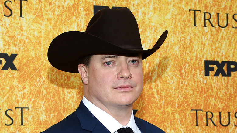 Brendan Fraser wearing cowboy hat