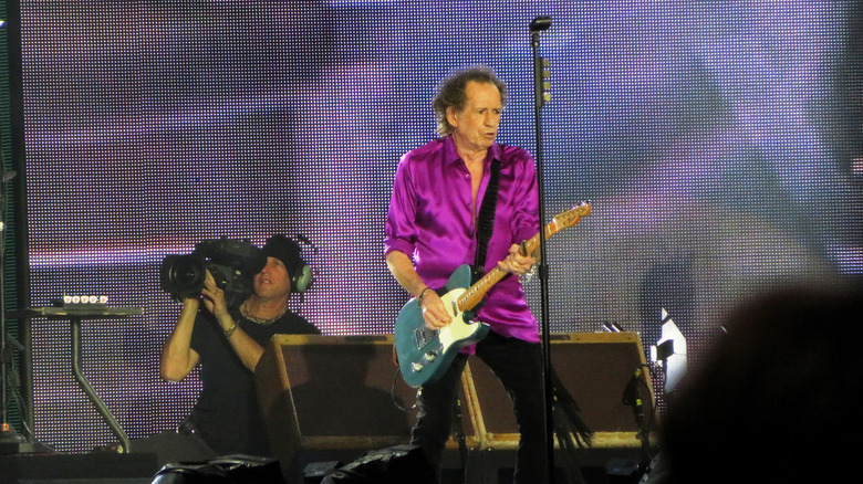 Keith Richards on stage in 2016 with cameraman