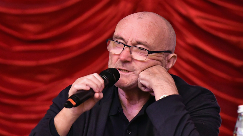 Phil Collins with microphone
