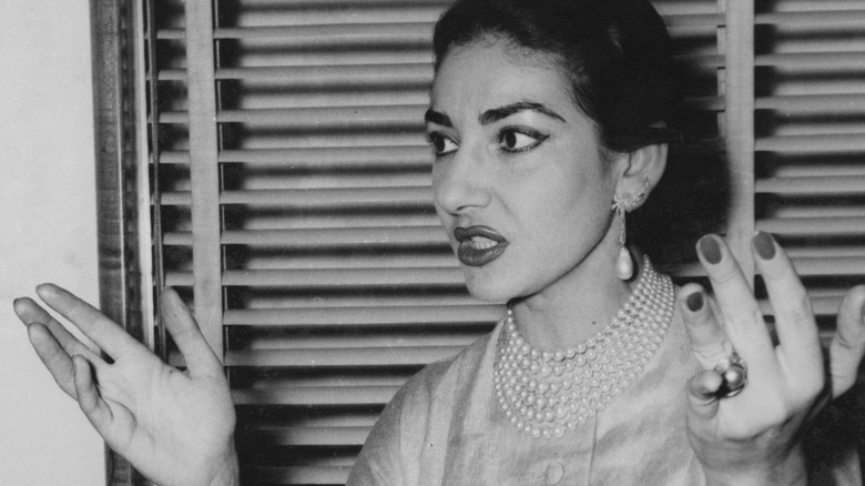 Maria Callas with hands in the air