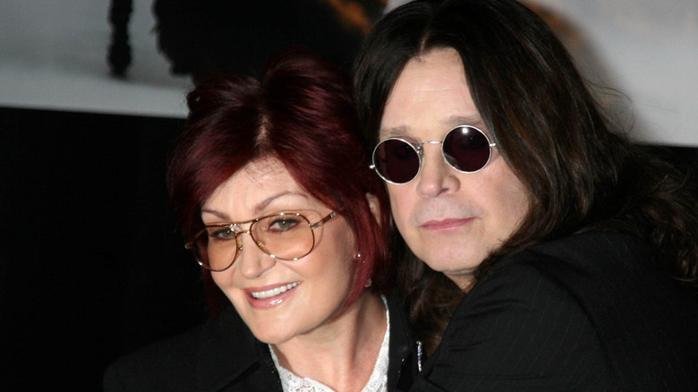 Sharon and Ozzy Osbourne embracing