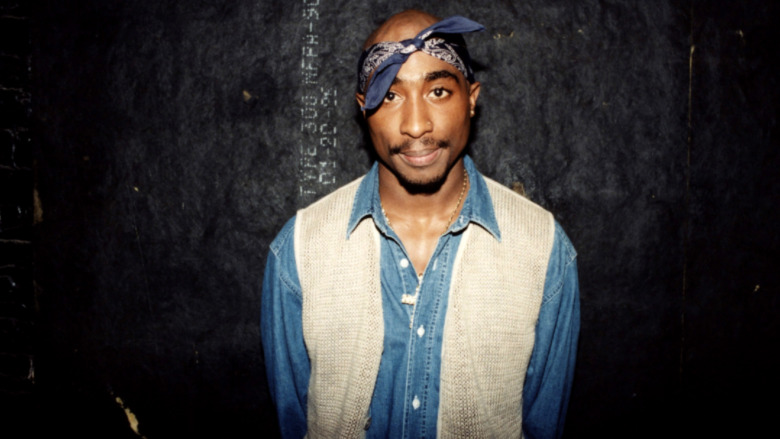 Tupac Shakur poses for photo