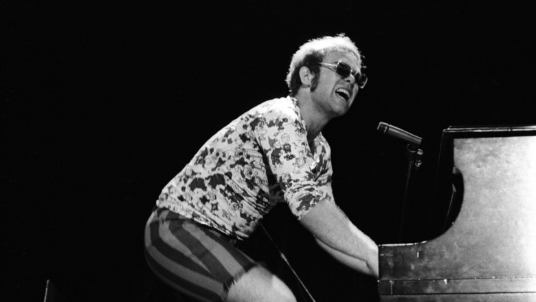 Elton John performing