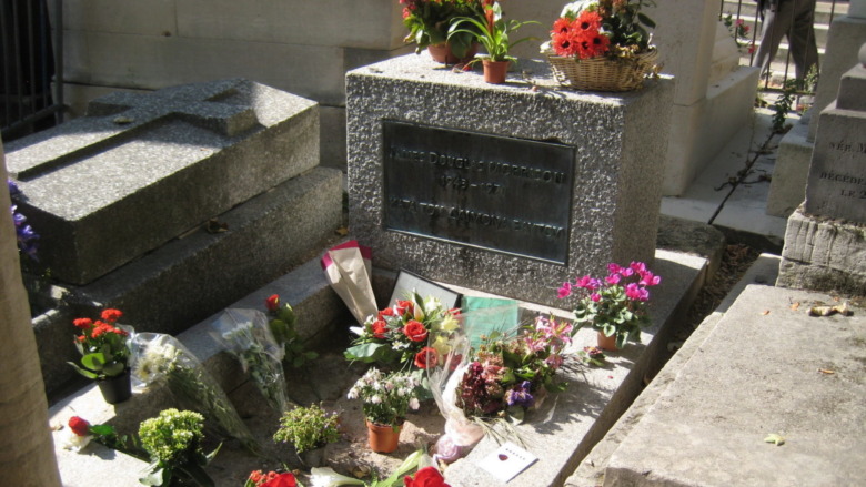 Cropped photo by Terrazzo via Flickr of Jim Morrison's grave in Paris, https://creativecommons.org/licenses/by/2.0/